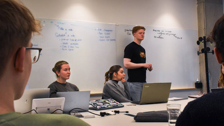Photo of team at client meeting